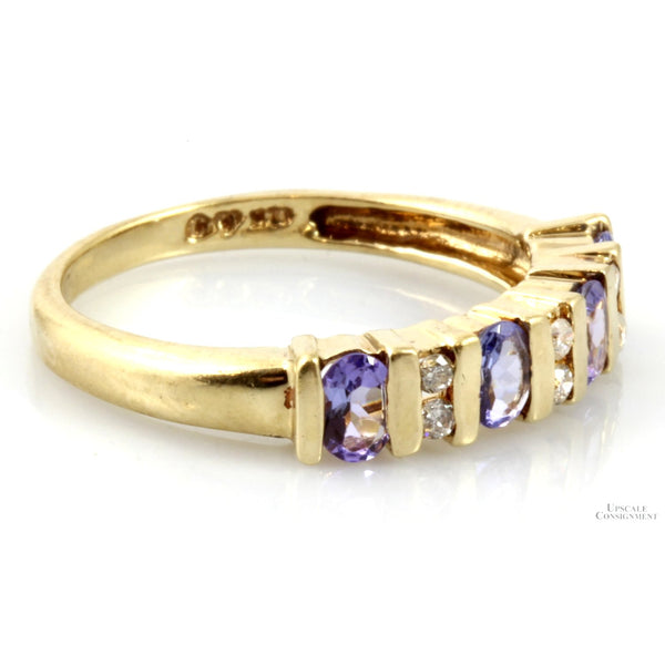 .64ctw Oval Tanzanite .08ctw Diamond 10K Gold Band