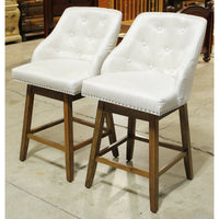 Pair of Button Tufted Swivel Counter Stools