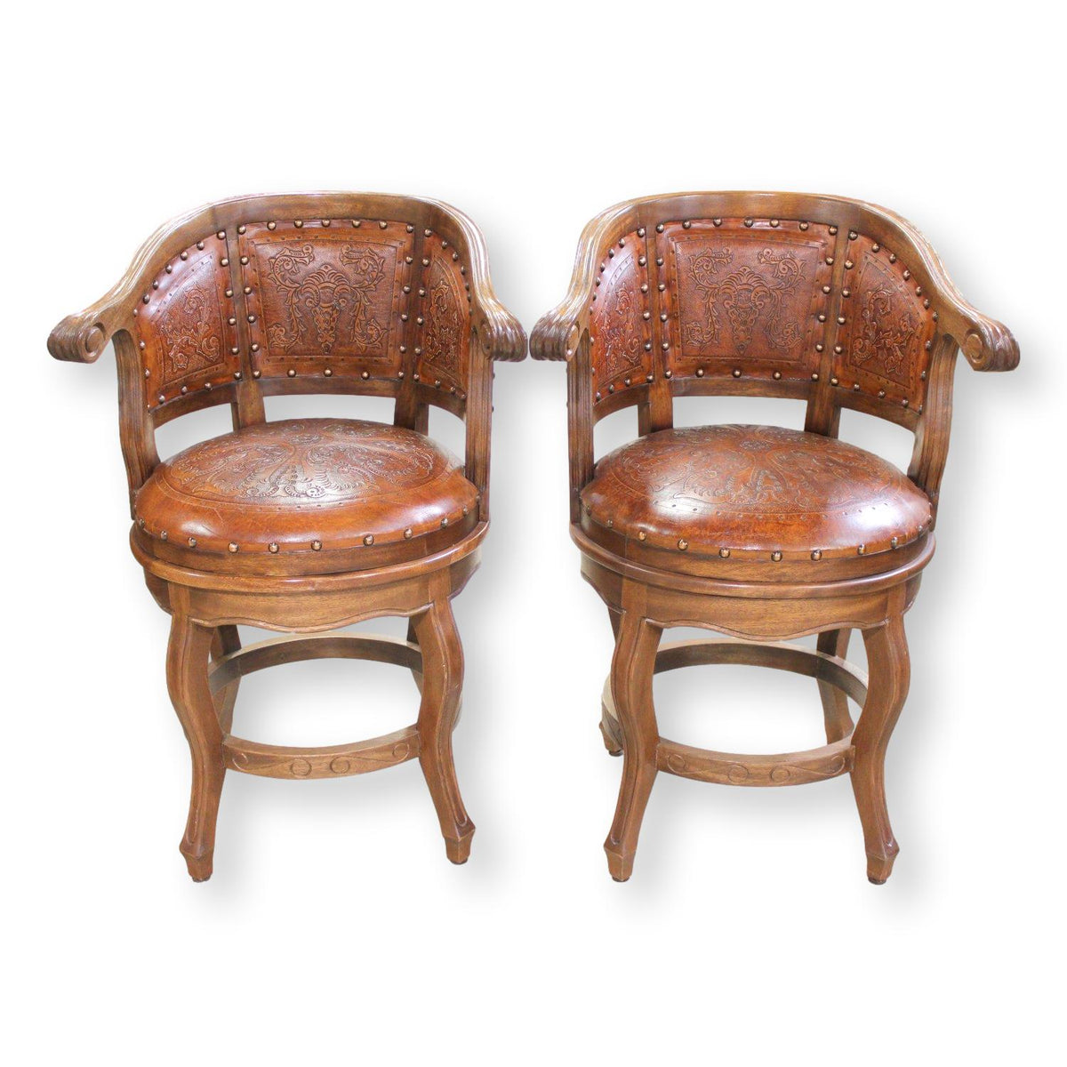 Pair of Embossed Leather Swivel Counter Stools
