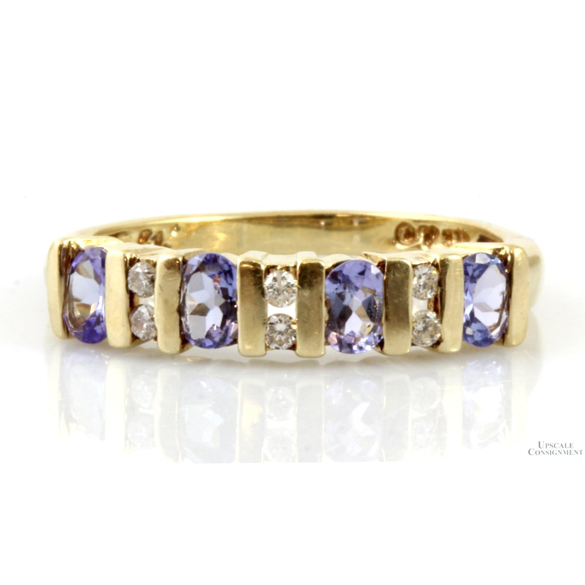 .64ctw Oval Tanzanite .08ctw Diamond 10K Gold Band