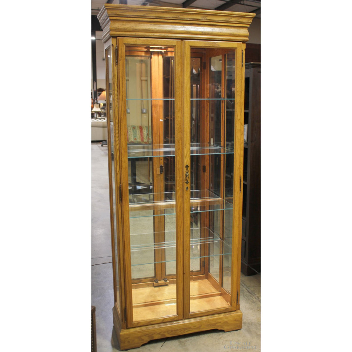 Howard Miller Oak Curio Cabinet