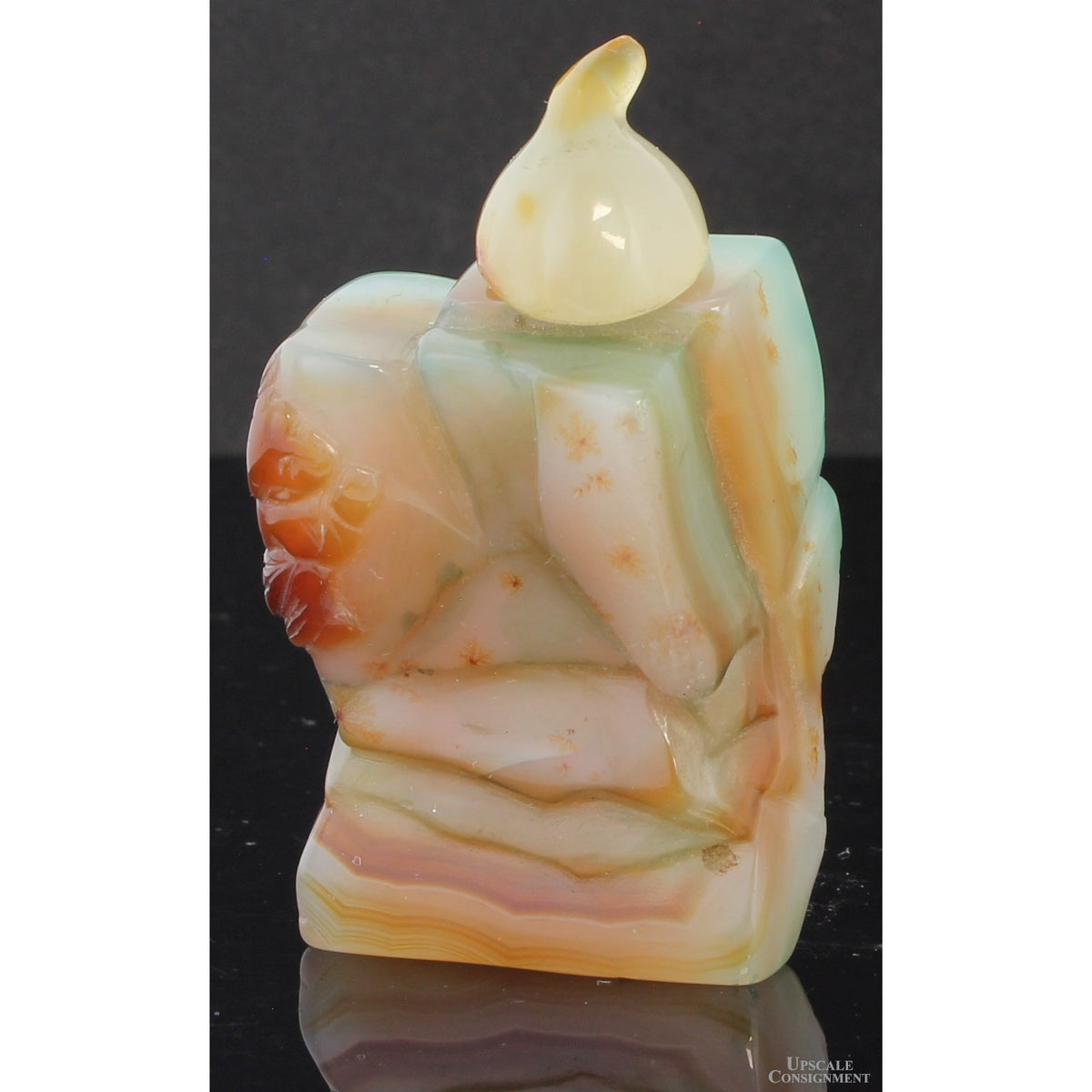 Chinese Hand-Carved Banded Agate Figural Snuff Bottle Depicting a Woman Cradling a Child