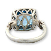Swiss Blue Topaz & Diamond Halo Ring in 14K White Gold