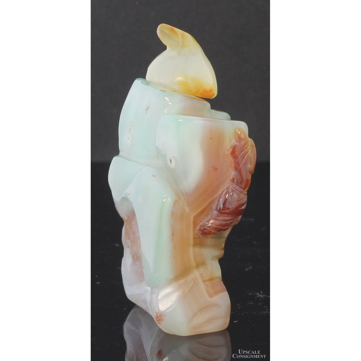 Chinese Hand-Carved Banded Agate Figural Snuff Bottle Depicting a Woman Cradling a Child