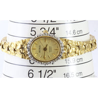 Gold Tone Bark Finish Lady's Quartz Watch Diamond Bezel