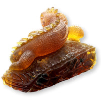 Hand-Carved Amber Lizard Sculpture with Wood Pedestal