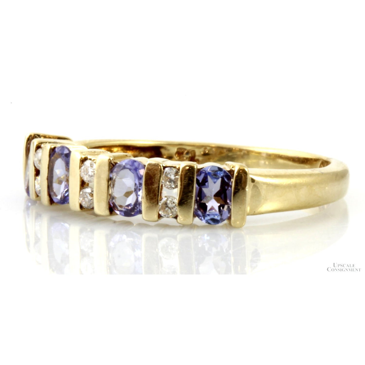 .64ctw Oval Tanzanite .08ctw Diamond 10K Gold Band