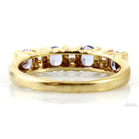 .64ctw Oval Tanzanite .08ctw Diamond 10K Gold Band