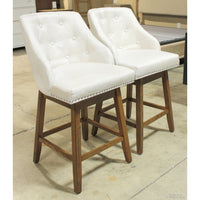 Pair of Button Tufted Swivel Counter Stools