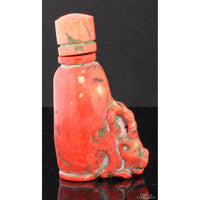 Mid-Century Chinese Hand-Carved Coral Figural Snuff Bottle Depicting a Mythical Guardian Beast