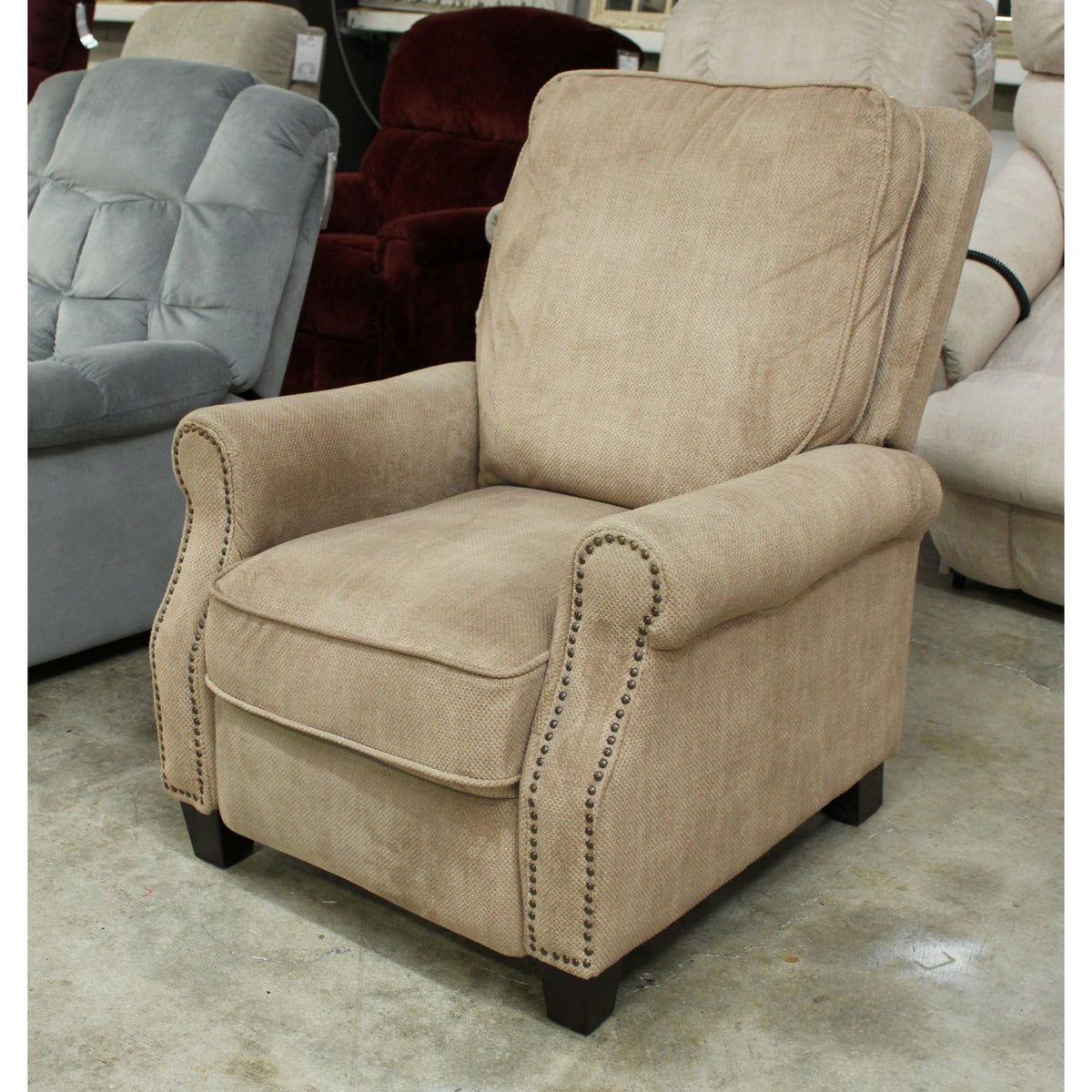 New Meridan Tan Push-Back Recliner