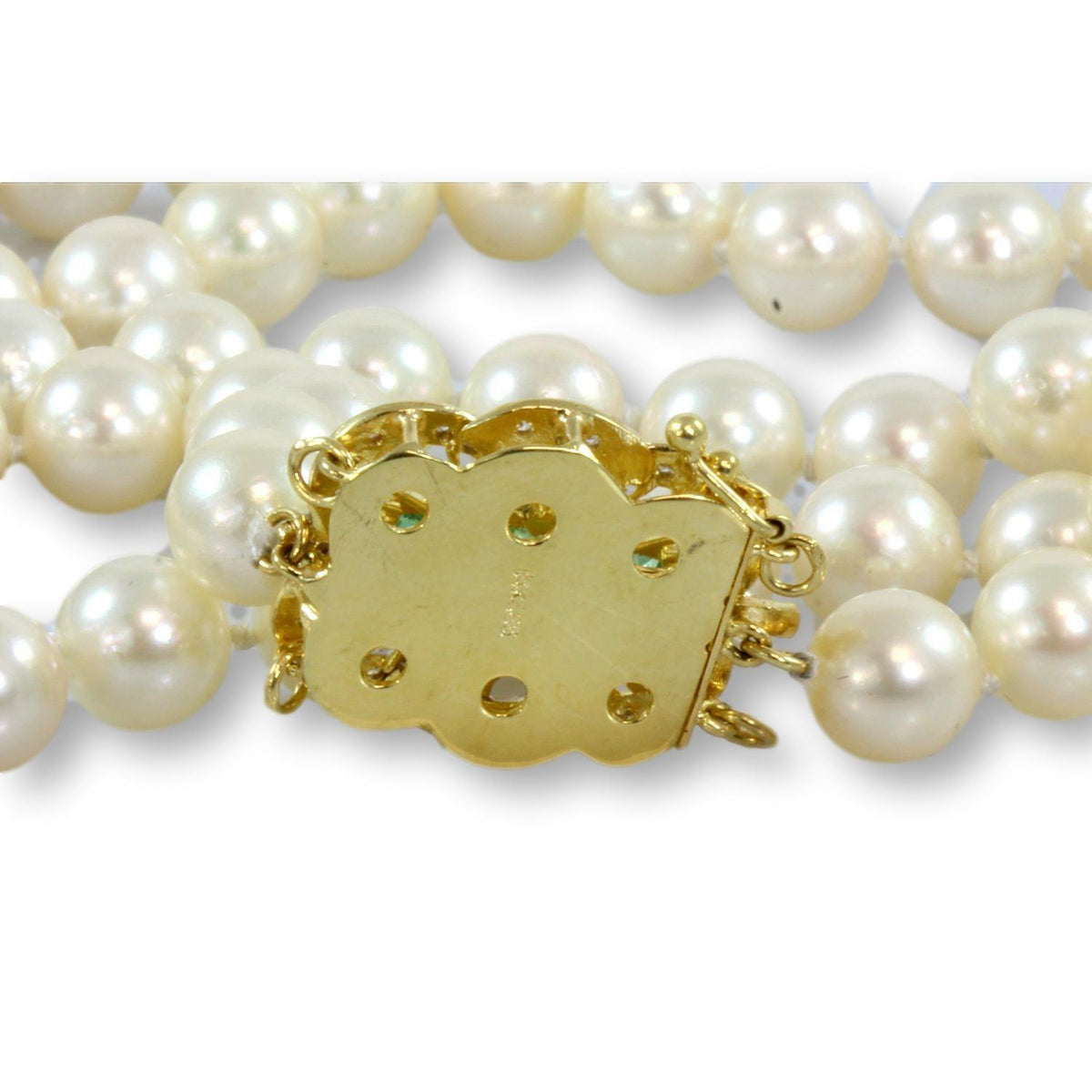 A Strand Of 8 MM Cultured Pearls With Diamond Clasp