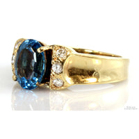 2.10ct London Blue Topaz & .18ctw Diamond 14K Yellow Gold Ring